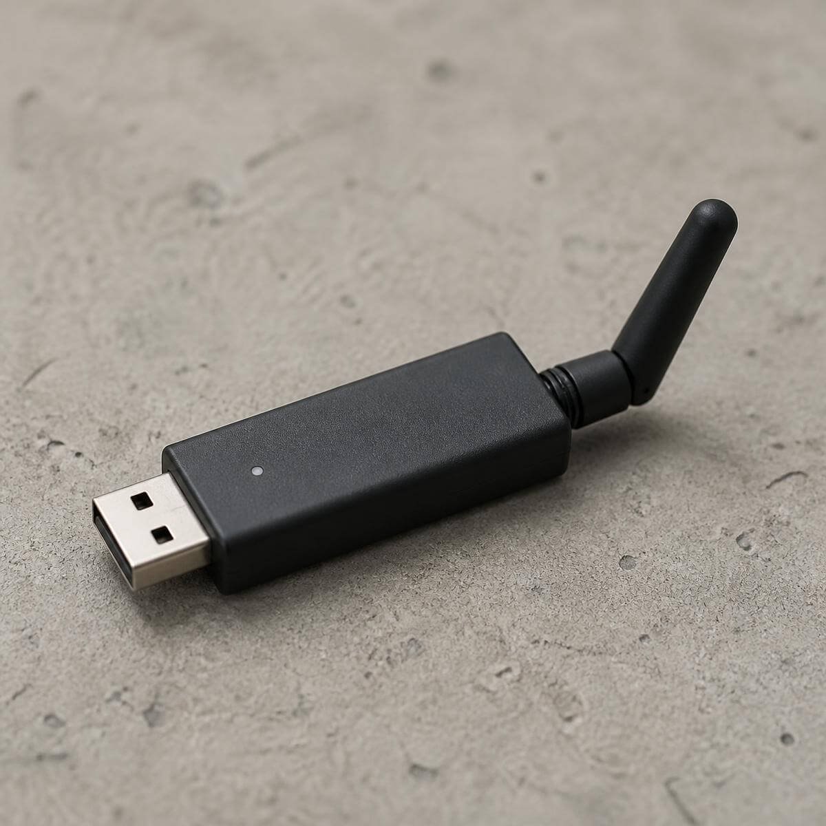 Compact matte black RangerPost USB LoRa vehicle tag